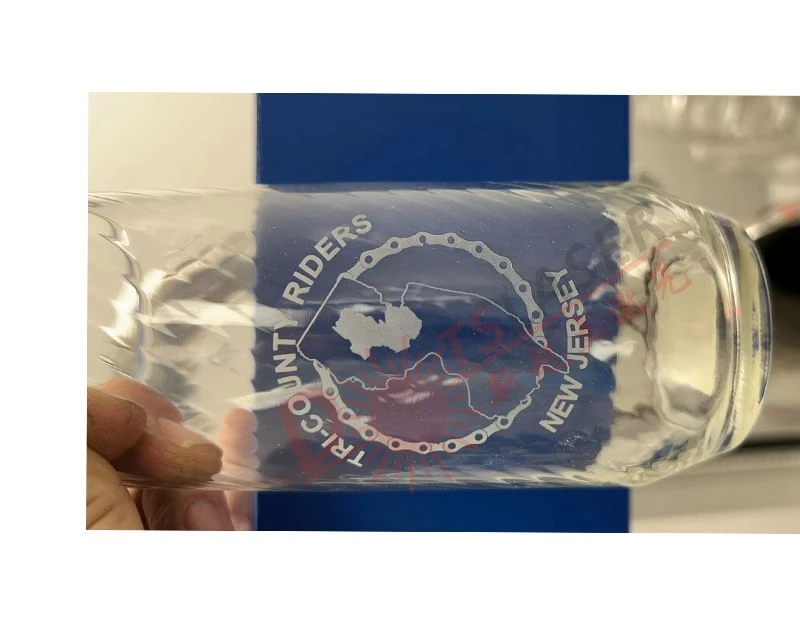 Laser engraving on glass cup Laser engraving on glass cup